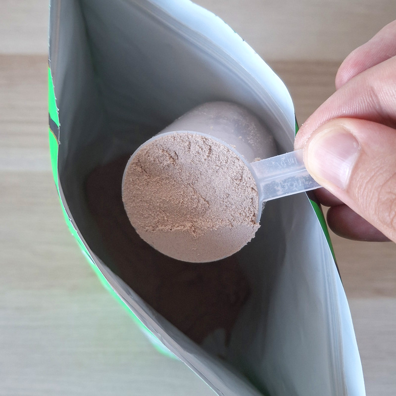 Photo d'une dosette de poudre de la whey Harder goût chocolat / noisettes